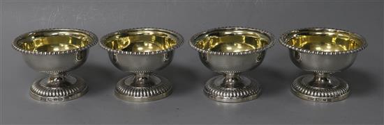 A set of four George IV circular footed salts, Waterhouse, Hodson & Co, Sheffield 1829, height 53mm.